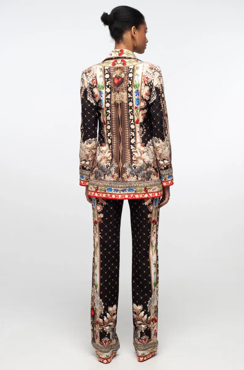 γυναικείο βελούδινο παντελόνι με διάφορα σχέδια σε μαύρο φόντο από την Peace and chaos, opulence pants