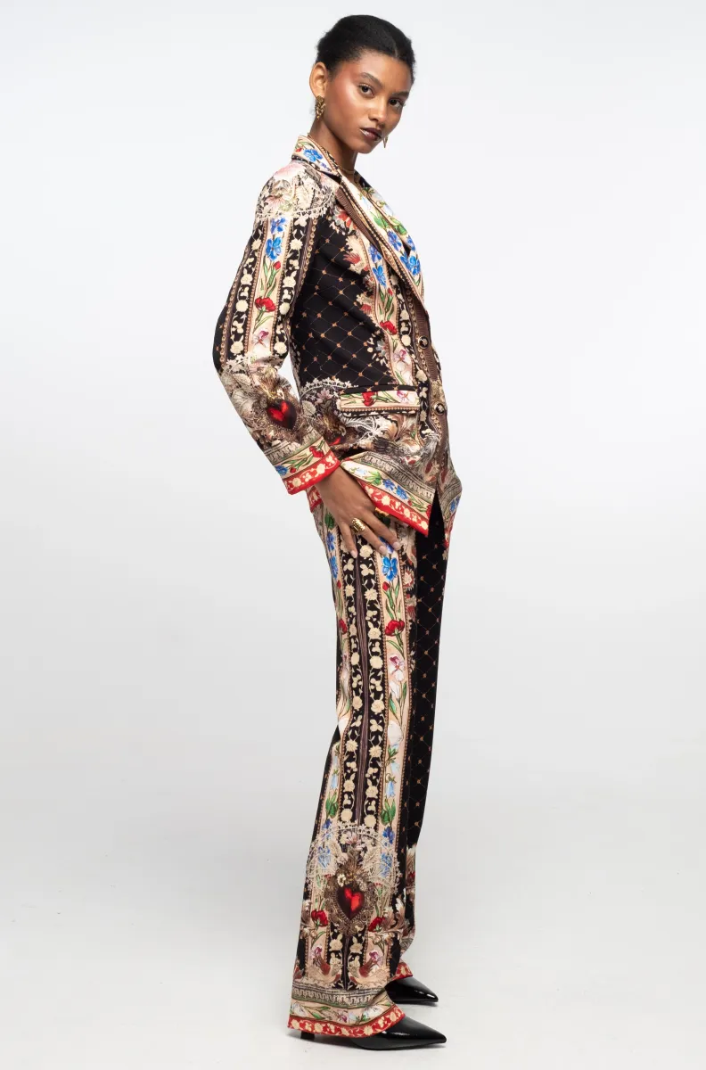 γυναικείο βελούδινο παντελόνι με διάφορα σχέδια σε μαύρο φόντο από την Peace and chaos, opulence pants