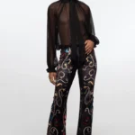 γυναικείο βελούδινο παντελόνι με μαύρο φόντο και διάφορα σχέδια από την peace and chaos, dusk pants