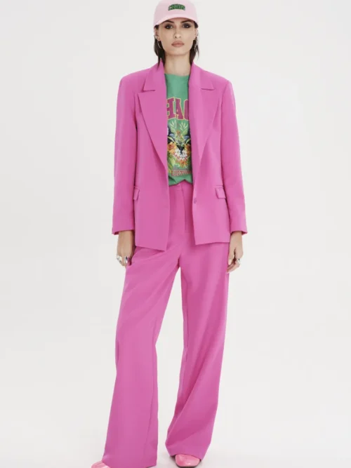 Παντελόνι από την εταιρία Peace and Chaos σε φούξια χρώμα.