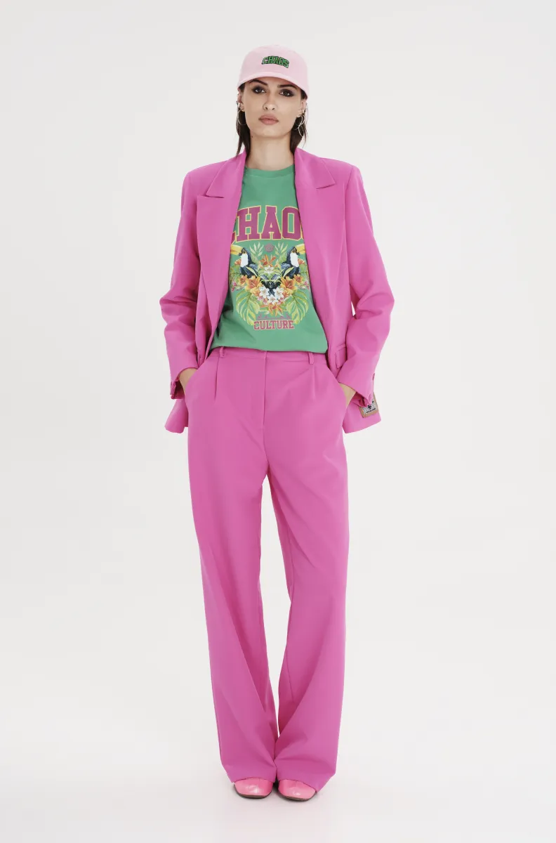 Παντελόνι από την εταιρία Peace and Chaos σε φούξια χρώμα.