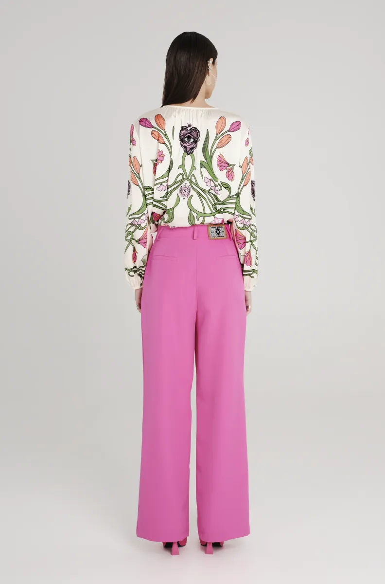 Παντελόνι από την εταιρία Peace and Chaos σε φούξια χρώμα.