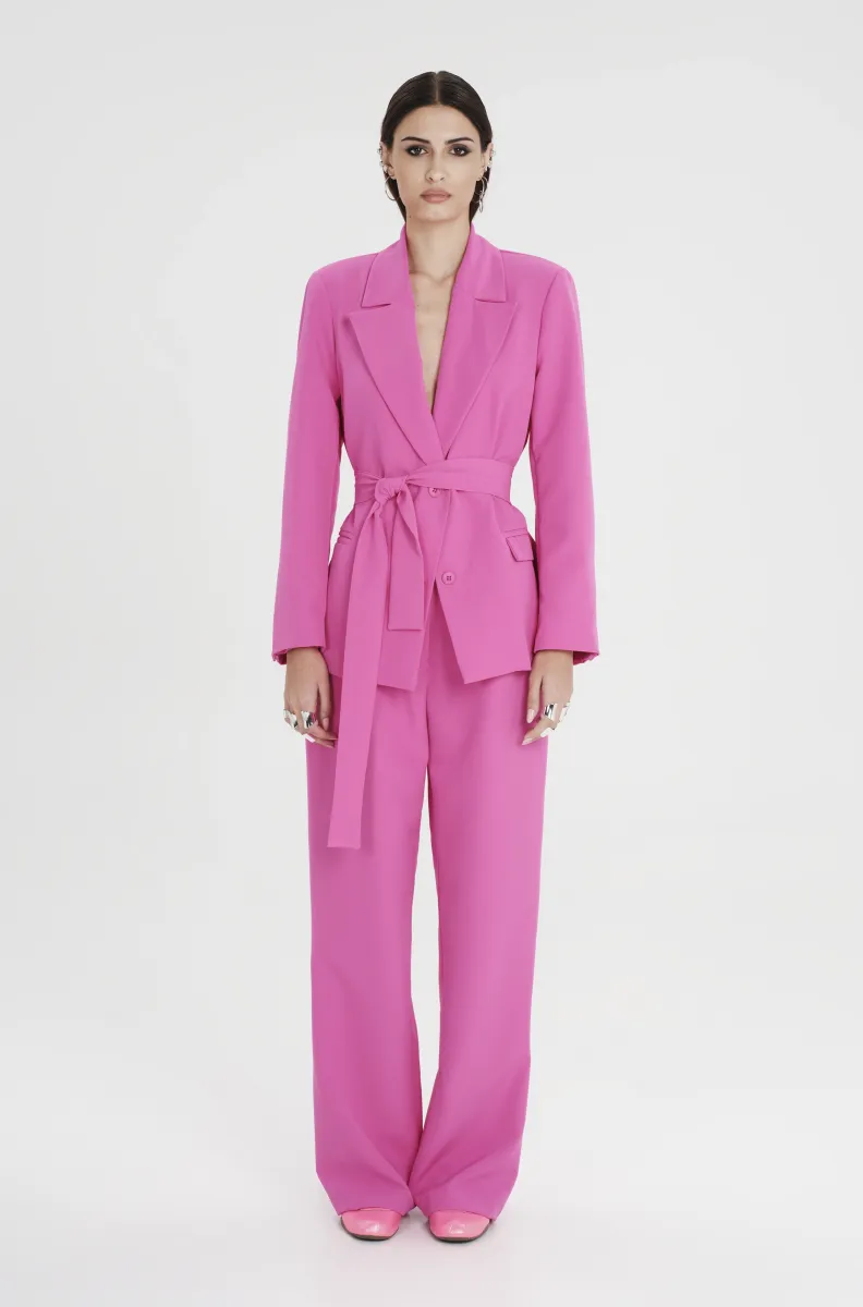 Παντελόνι από την εταιρία Peace and Chaos σε φούξια χρώμα.