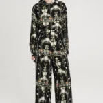 Παντελόνι σε μαύρο χρώμα με σχέδια από την εταιρία Peace and Chaos.