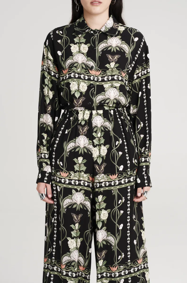 Παντελόνι σε μαύρο χρώμα με σχέδια από την εταιρία Peace and Chaos.