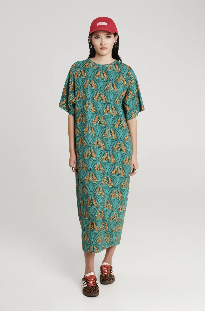 Πετρόλ φόρεμα με σχέδια από την εταιρία Peace and Chaos.