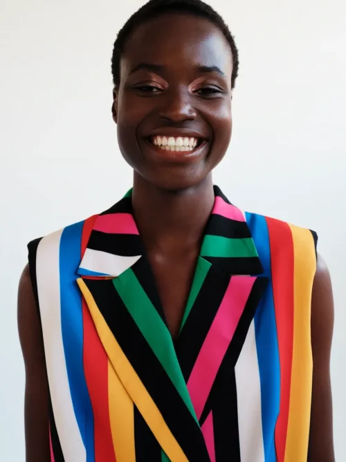 Μακρύ γιλέκο με πέτα και σταυρωτό κούμπωμα Σατέν φόδρα Διπλές φιλέ τσέπες Μεταλλική λεπτομέρεια Chaka