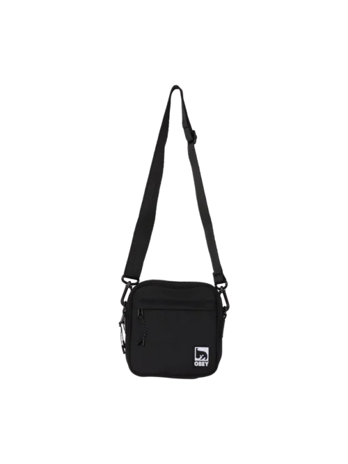 Η OBEY Half Eye Crossbody Bag συνδυάζει λειτουργικότητα και χαρακτηριστικό streetwear design.