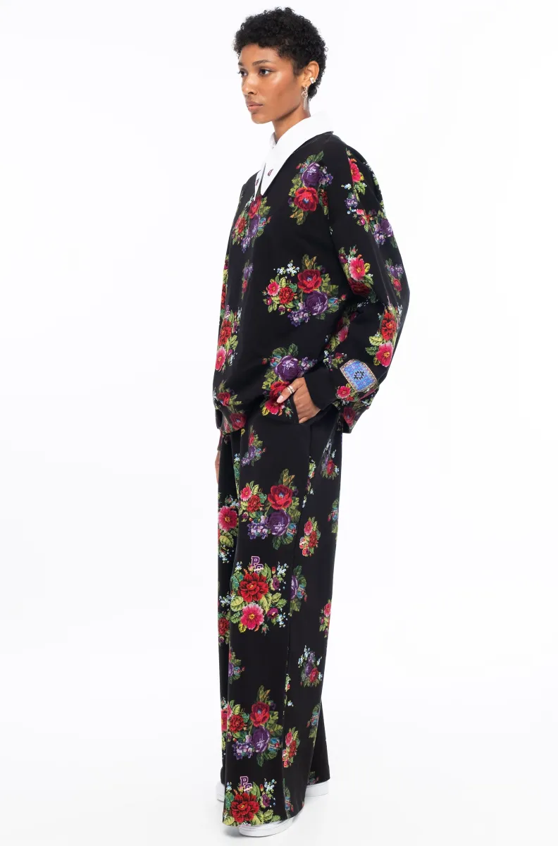 Το Bouquet Pants της Peace + Chaos συνδυάζει άνεση και κομψότητα σε ένα σύγχρονο, relaxed σχέδιο. Είναι κατασκευασμένο από βαμβακερό jersey τύπου sweatshirt, προσφέροντας απαλή αίσθηση και άνεση στην καθημερινή χρήση.