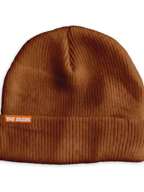 Ζεστό και ξεχωριστό σκουφάκι Nut Warmer Beanie σε μπορντό χρώμα, με το χαρακτηριστικό Dudes logo και το ιδιαίτερο artwork Vermillon Nut Warmer, σχεδιασμένο από τον καλλιτέχνη McBess.