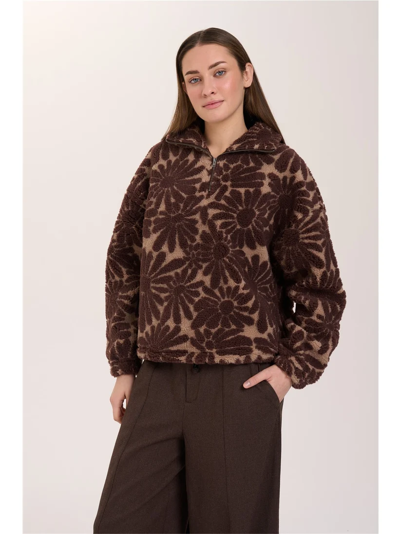 Γυναικείο φούτερ από απαλό ύφασμα teddy fleece, με εντυπωσιακό floral μοτίβο σε καφέ και μπεζ αποχρώσεις.
